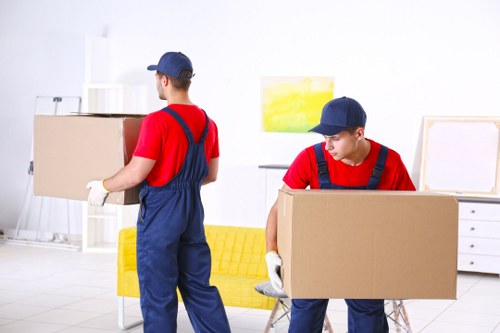 Removal team planning a move in Colliers Wood near local flats and homes