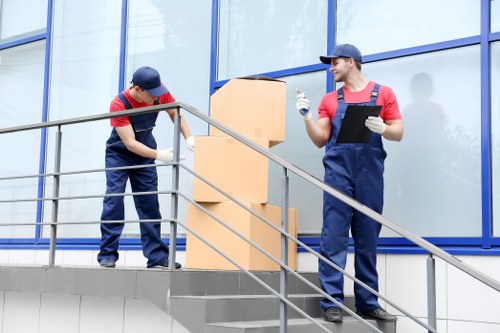 Crew loading household items during a move in South West London
