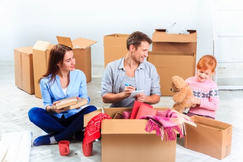 Careful loading of household items for a Colliers Wood move