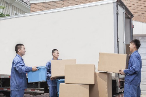 Office furniture and IT equipment prepared for removal in Colliers Wood
