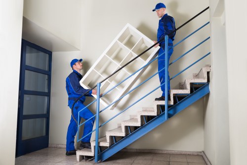 Local movers transporting belongings from a Colliers Wood flat with parking considerations