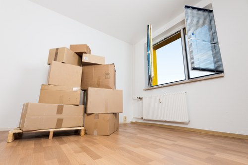 Preparing boxes and furniture for a local move in Colliers Wood