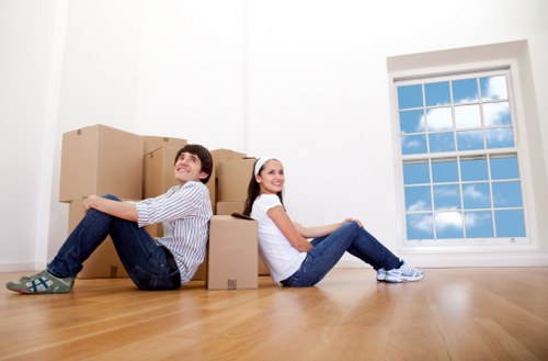 Packing and loading items for a business relocation in Colliers Wood