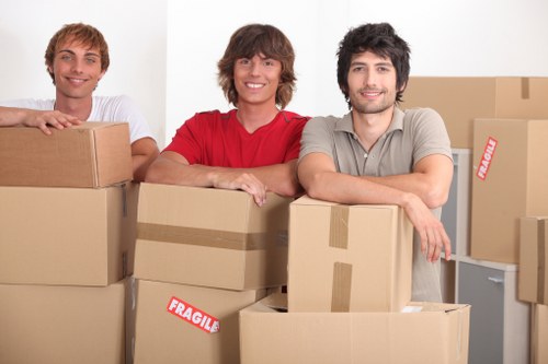 Local commercial removals team handling office furniture in Colliers Wood