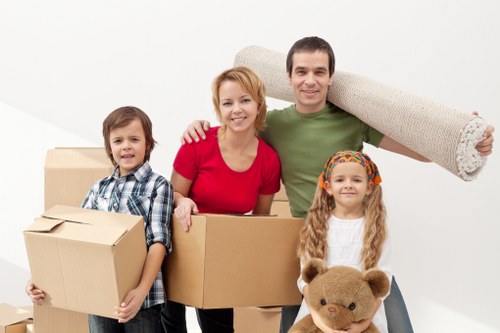 Removals crew preparing a property move with organized packing in Colliers Wood