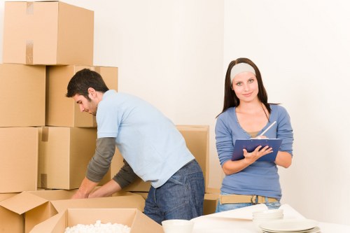 Professional removals staff handling a complaint resolution