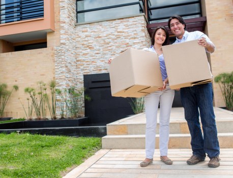 Packing and loading household items for a move in Colliers Wood